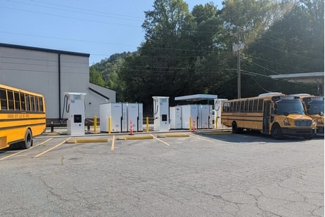 Cherokee Boys Club electric buses under solar canopy